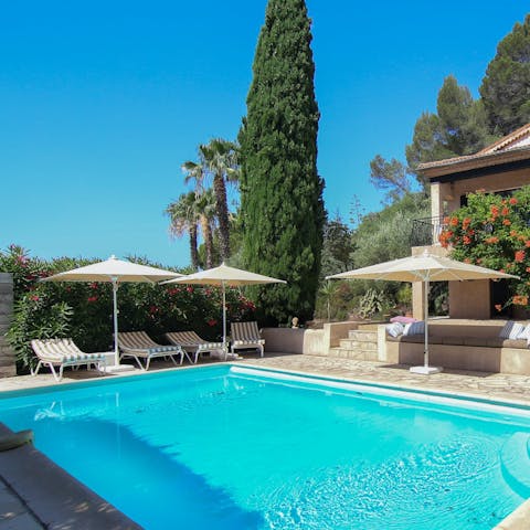 Lie back on the sun loungers and dry off after a morning swim in the pool