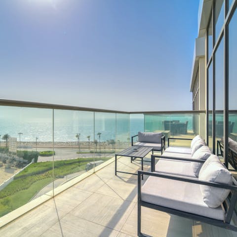 Listen to the sound of the waves from the private balcony