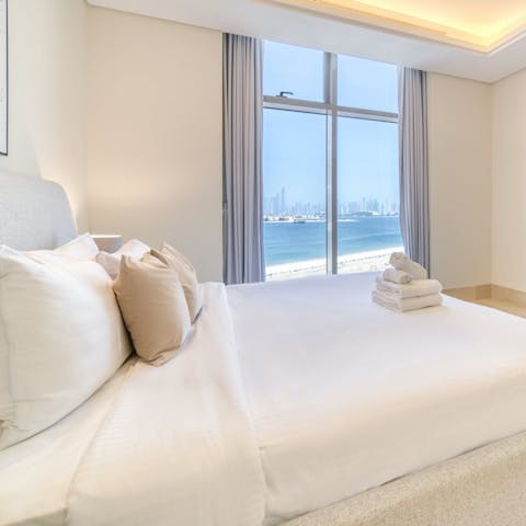 Wake up to beach and Persian Gulf vistas from the bedrooms