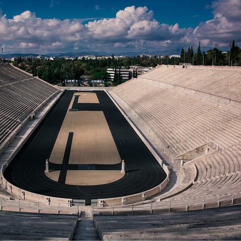 Run in the footsteps of athletes at the Panathenaic Stadium – a six-minute walk
