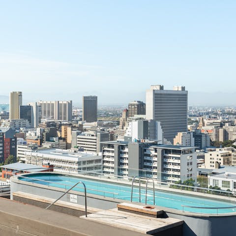 Swim in your communal pool with the city as your backdrop