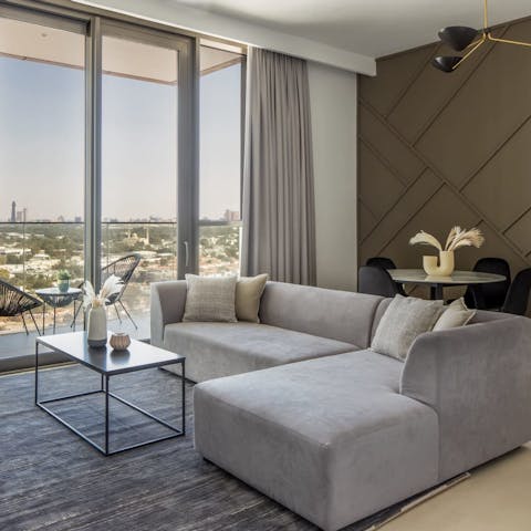 Drink, dine or simply kick back and relax in the open-plan living room while enjoying dreamy Dubai views