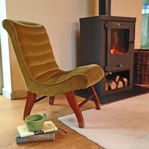 Snuggle up beside the wood burning stove on chilly evenings