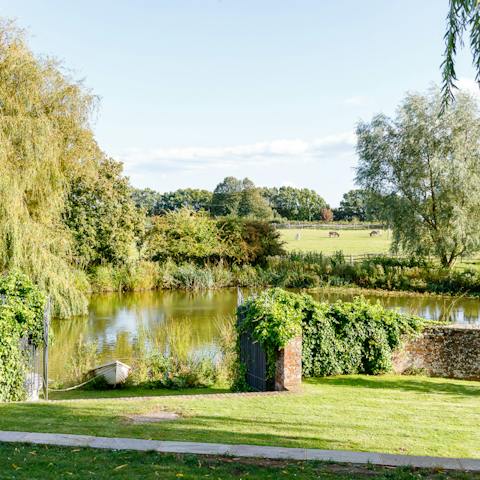 Admire the views across the pond to the rolling East Sussex countryside