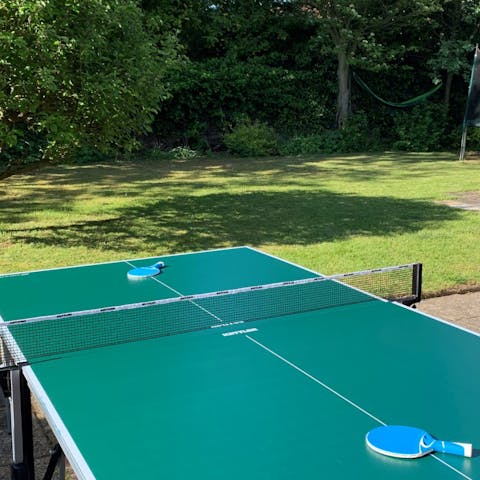 Challenge someone to a game of table tennis in the garden