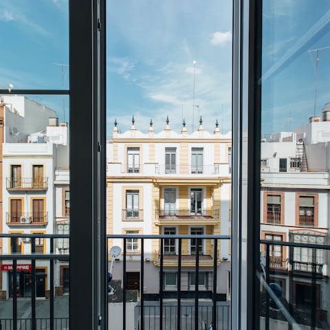 Step out onto the apartment's balcony and catch the Sevillian sunset