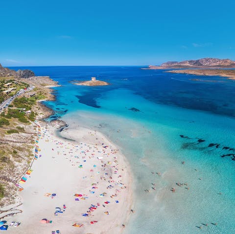 Pack your bucket and space and head to La Pelosa Beach for the day, you're just 250 metres away