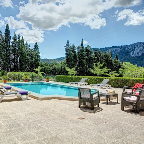 Feel serenaded by the mountain views whilst relaxing by the pool