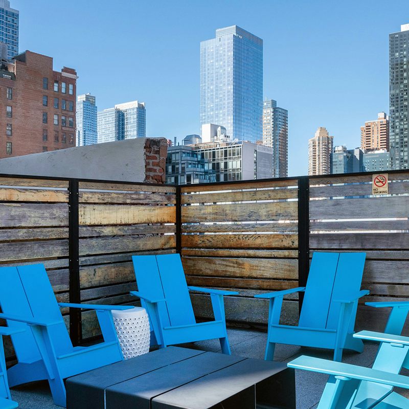 Relax out on the rooftop terrace with skyscraper views of Manhattan