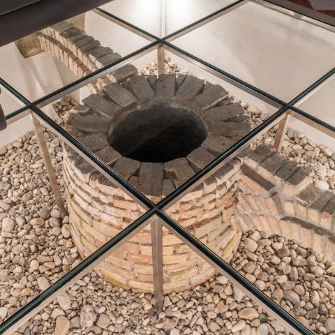 Admire an ancient well through the living room's glass floor