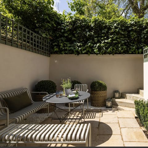 Sit out with sundowners on your private patio, complete with outdoor seating