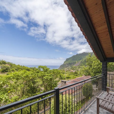 Admire the Atlantic Ocean and forest views from your private balcony