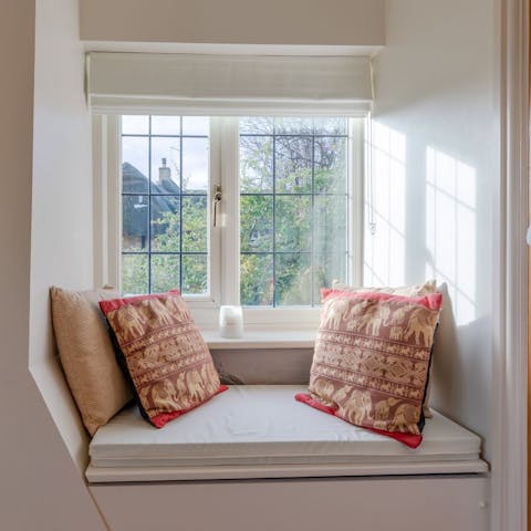 Take in views of the neighbouring chocolate box houses from the window seat