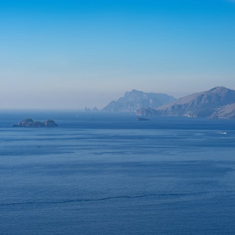 Spend a day paddling the waters of Marina di Praia, a short drive away