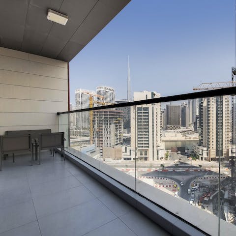 Soak up the views of the city skyline from the private balcony