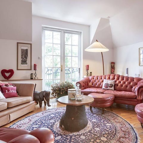 Enjoy an evening of wine and conversation in the elegant living room