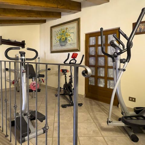 Keep up with your fitness routine in the cosy gym