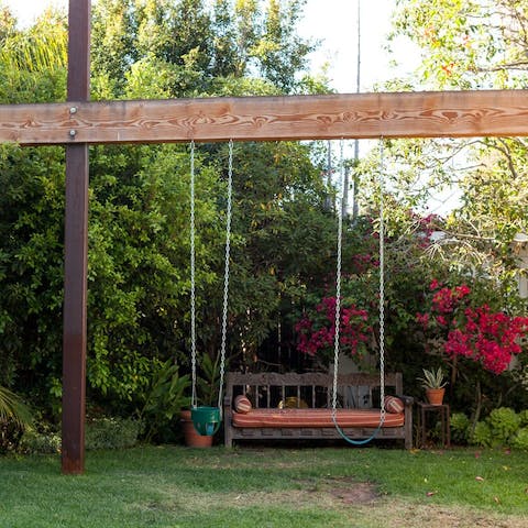 Make time for some family fun on the swings