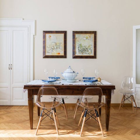 Dine at the stylish dining table surrounded by period features