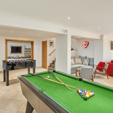 Entertain yourselves in the games room where you'll find pool and table football