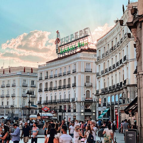 Visit the buzzing Puerta del Sol, about twenty minutes away by metro