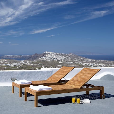 Stretch out on a sun lounger and admire the stunning views
