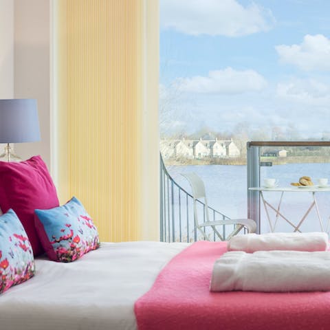Soak up the lakeside vistas with morning cuppas on the bedroom balcony