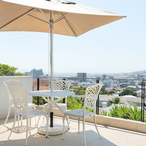 Soak up the sun from your private balcony, with views across the city