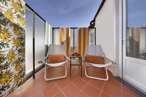 Soak up the sun from the cosy private balcony