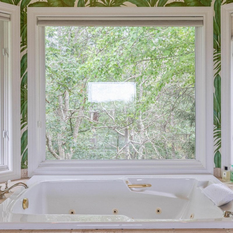 Take a wild soak in company of surrounding forestry
