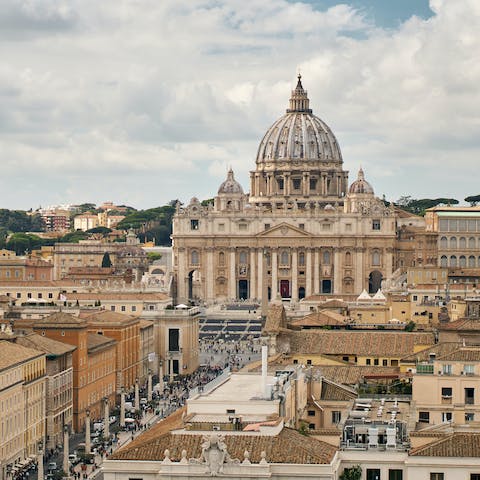 Wonder at the stunning architecture of St. Peter's Basilica, which can be reached in atwenty-minute walk from home