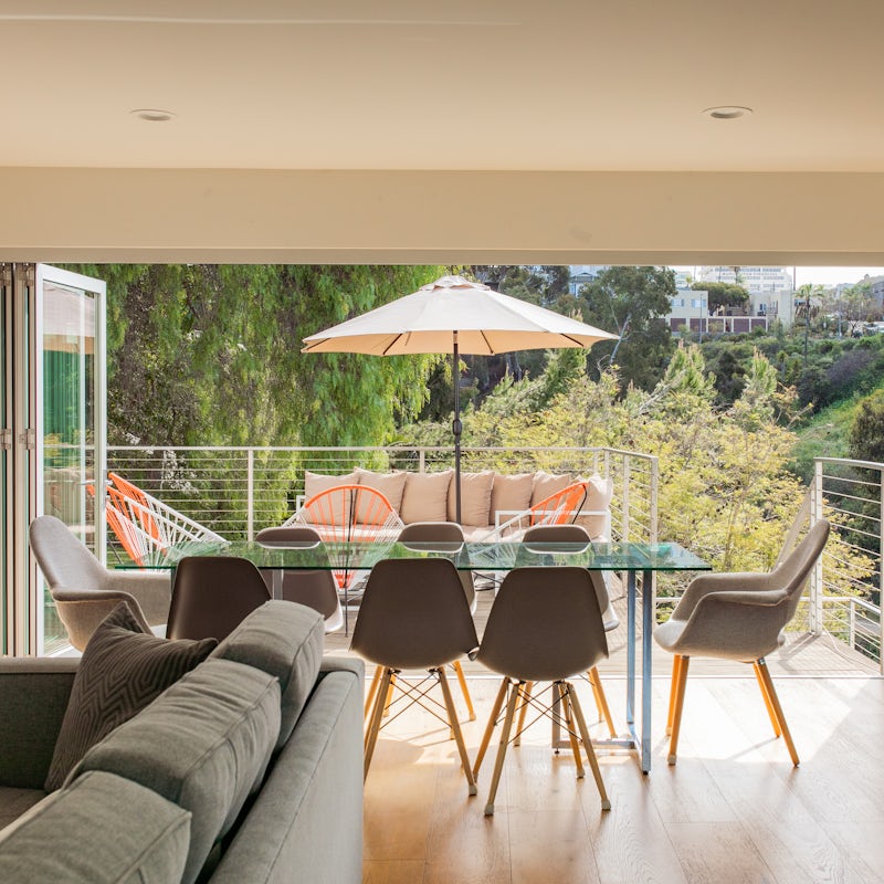 Enjoy a gentle breeze as you dine in the bright living space