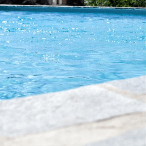 Dive into the refreshing waters of the communal pool