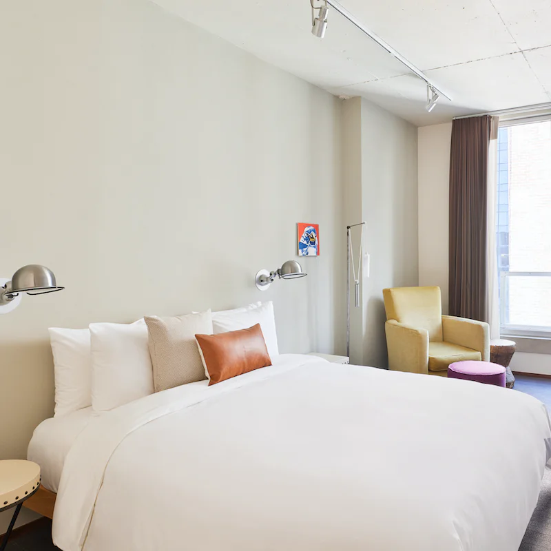 Find the perfect spot to relax in bed after a day of exploring