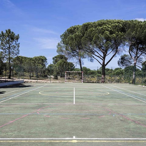 Play a game of football or volleyball on the multi-sports field