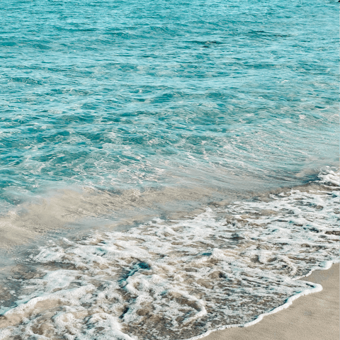 Stroll along the golden sands of the beach, just a four minute walk away