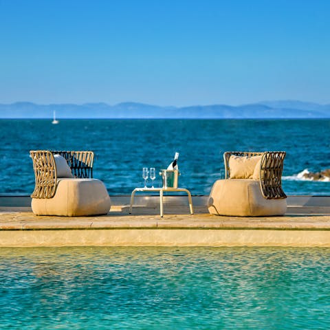 Admire the stunning sea views from the patio or the pool