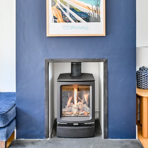 Spend cosy evenings curled up by the wood-burning stove