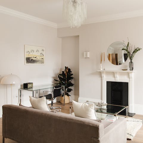 Come home and relax in the bright and breezy living space – we loved the traditional Victorian features