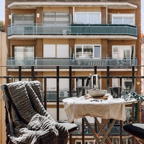 Sip your morning coffee on the private balcony