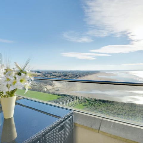 Start your mornings on the balcony with gorgeous views of the beach