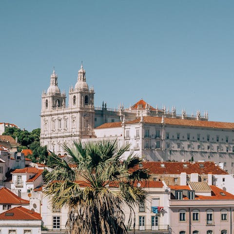 Explore the historic streets of Lisbon's Alfama district