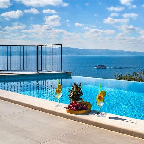 Glide gracefully through the infinity swimming pool and gaze out over the Adriatic Sea