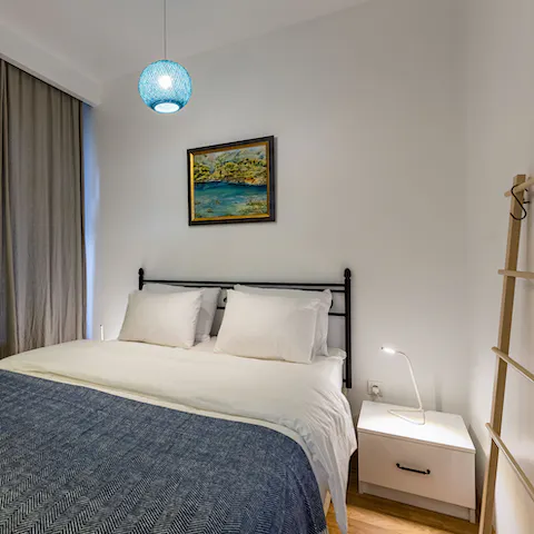 Sink into your crisp white bedsheets, the buzz of the city just outside your window