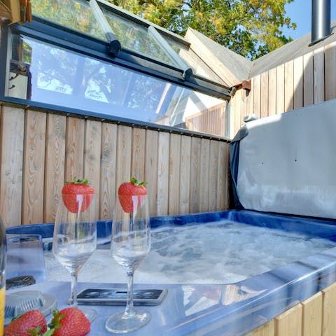 Pour a glass of bubbly and soak in the hot tub