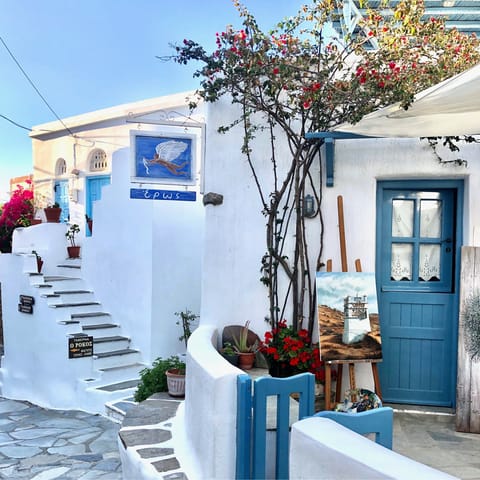 Hop in the car and explore the traditional towns of Tinos