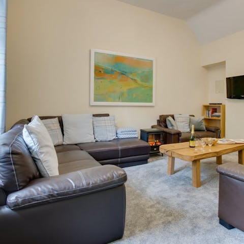 Chill out in the living area after a hike along the Wales Coast Path – directly accessible from the grounds