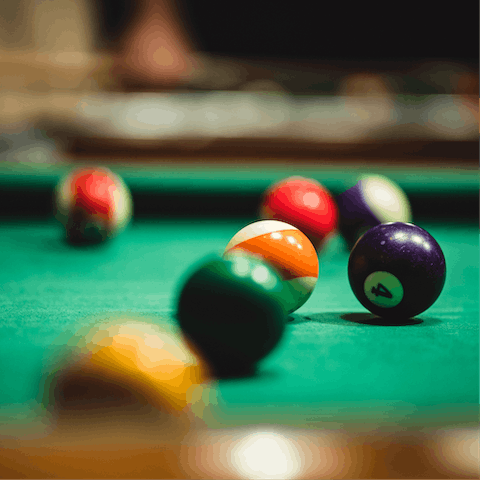 Gather in the games room for a round of billiards