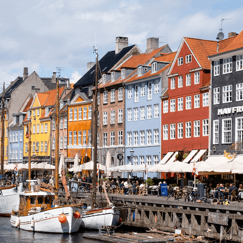 Join the bustle of Nyhavn Harbour, a stroll away