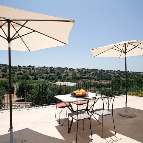 Mix yourself up an aperitif and enjoy on the private terrace overlooking the Sicilian countryside